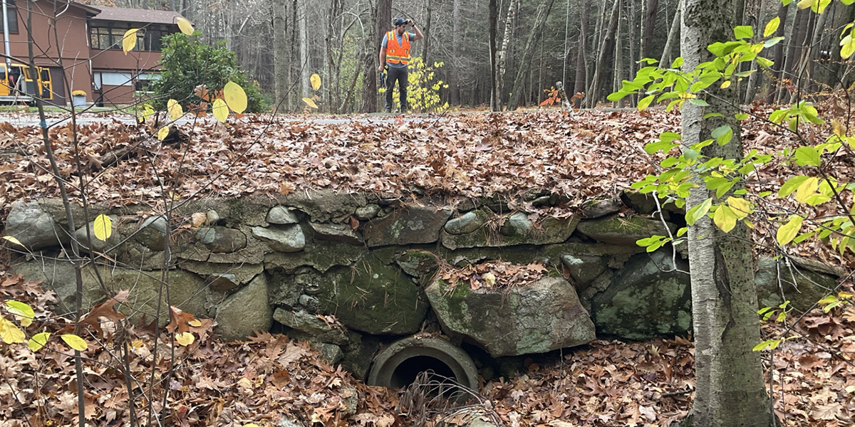 Nitsch engineers inspect a culvert in Carlisle