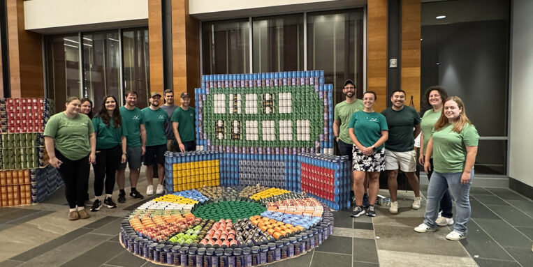 Nitsch Team members standing around Canstruction 2025 structure