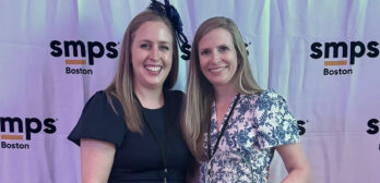 Virginia Kilbourn receiving SMPS Boston Award from Molly Romano