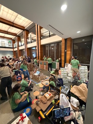 Nitsch team working on unboxing our cans and setting up supplies