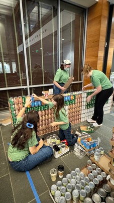 Nitsch team carefully placing our cans